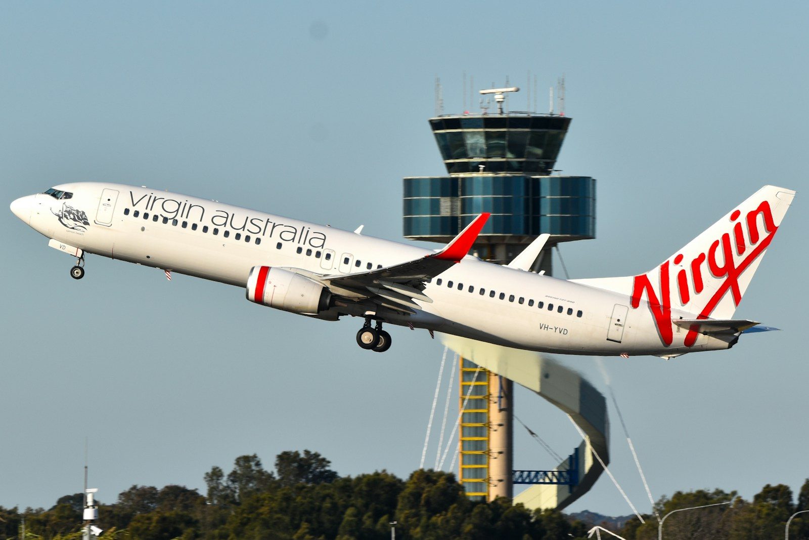 A large passenger jet taking off from an airport