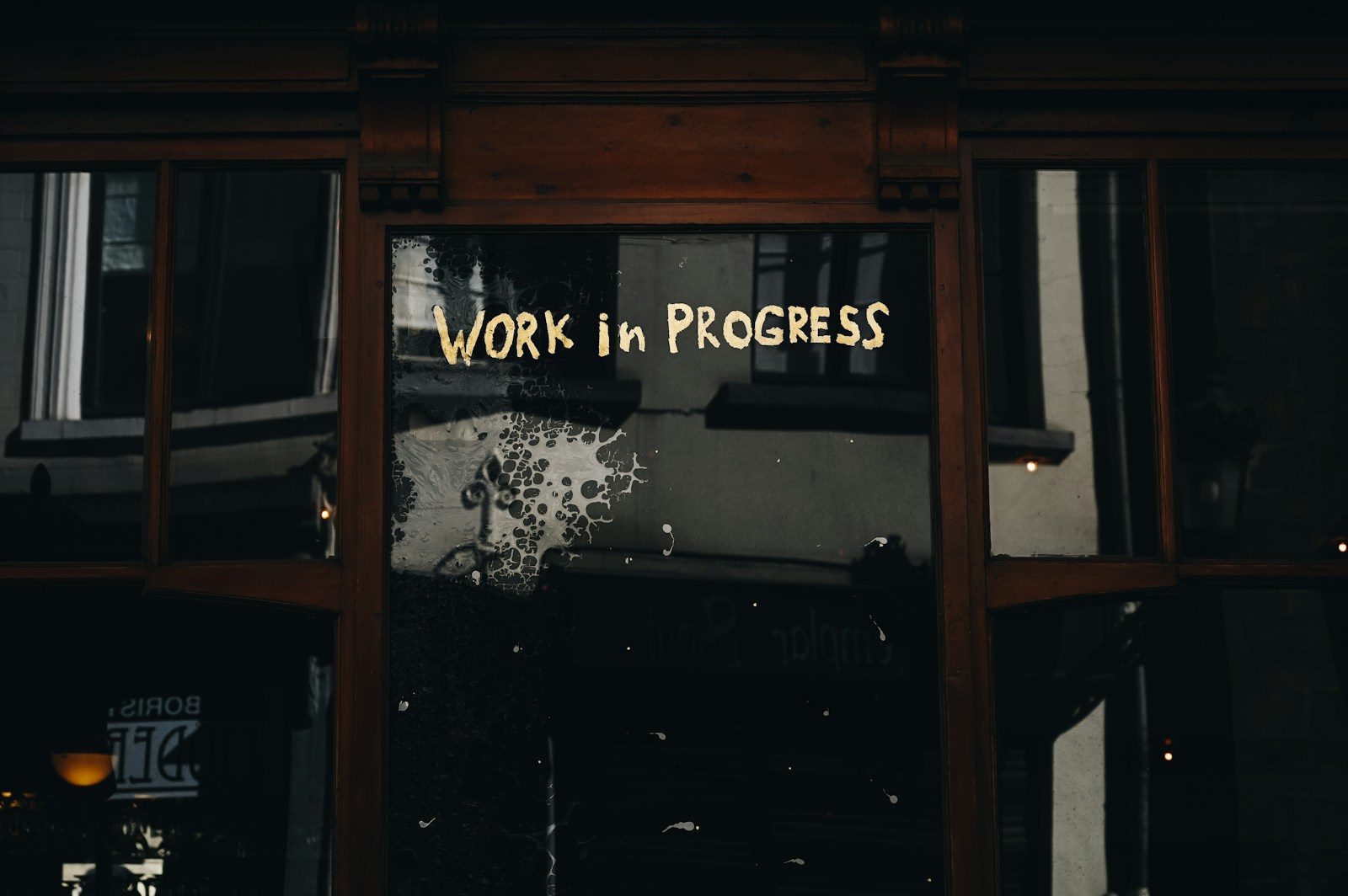 work in progress painted on window